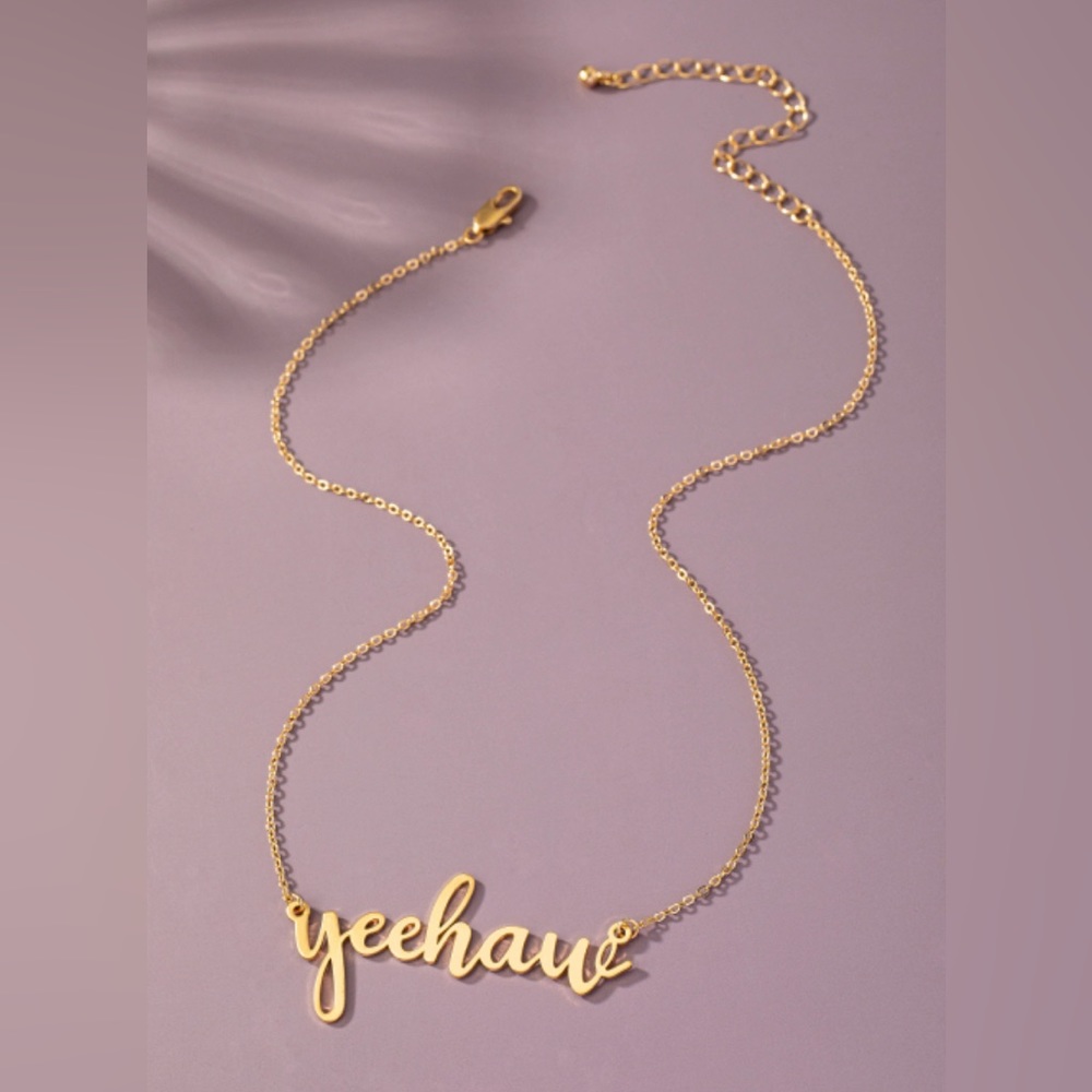 Gold yeehaw statement necklace